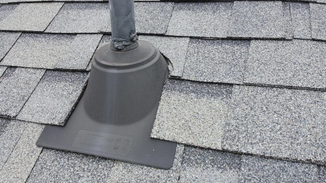 Vent & pipe boot replacement roofing technician fixing roof leak in North York