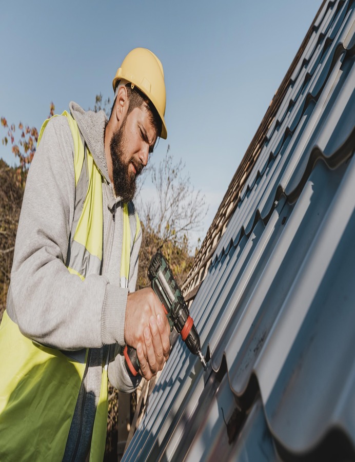 roofing contractor fixing leak in East York