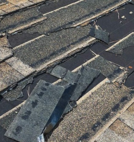 Wind storm damage repair contractor working in Edmonton