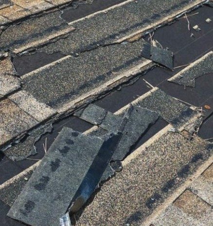 Wind storm damage repair contractor working in Edmonton